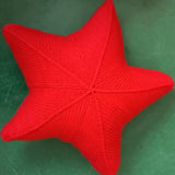 Artisanal Hand Knitted Starfish Cushion for Coastal Decor