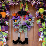 Festive Halloween Door Wreath with Witch Legs & Striped Stockings